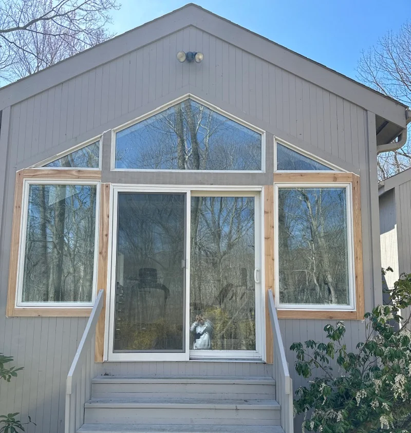 Andersen 400 Series Casement windows installed in Guilford, CT - finished with cedar trim